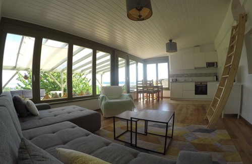 Balatonfured House | A newly renovated old wine cellar with a view of Lake Balaton and the city.