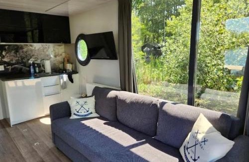 Lisserbroek Boat Rental | A nice Tiny House on the water