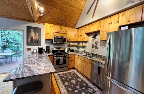 Idaho Springs Cabin | A River Front Mountain Luxury Cabin- Relaxing, Skiing, Rafting, Hot Tub, Sauna