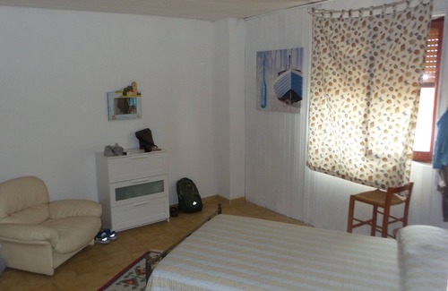 Le Castella House | a room in the picturesque village of Le Castella