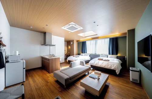 Hatsukaichi Hotel | A room with a skylight An open space filled with natural light Conveniently located within a 5min/Hatsukaichi Hiroshima