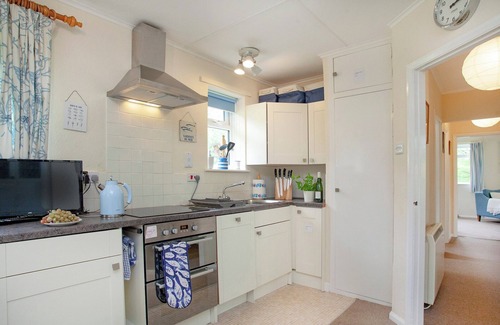 Trelowth Cottage | A spacious bungalow for four overlooking a wooded valley with its own garden.