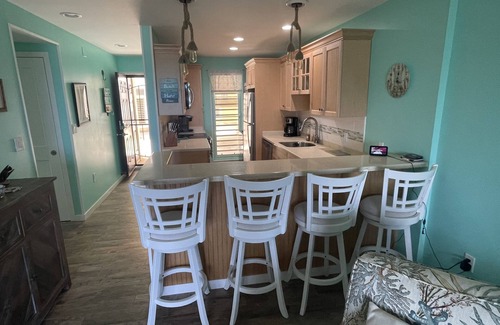 Estate Golden Rock Condo | A Tropical Paradise Inside and Out, right on the Beach!