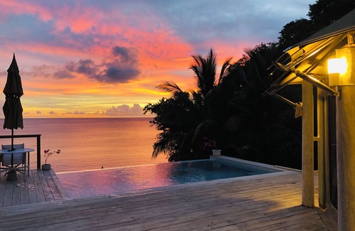 Vigie Villa | A Waterfront Luxury Tented Experience, with a Saltwater Infinity Pool and Beach.