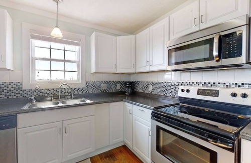 Cedar Lane House | A Wave From It All Rental is minutes from Sargent Beach and Handicap Accessible