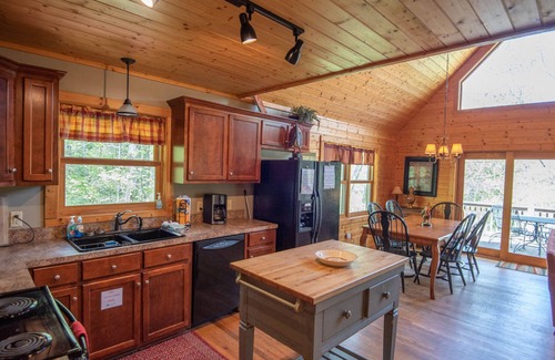 West Jefferson Cabin | Above the River | 5 Min. Walk to Water | Hot Tub & Family Game Room