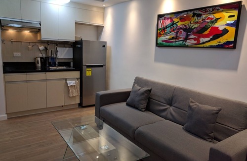 Poblacion District Condo | Abreeza Place with indoor parking and balcony