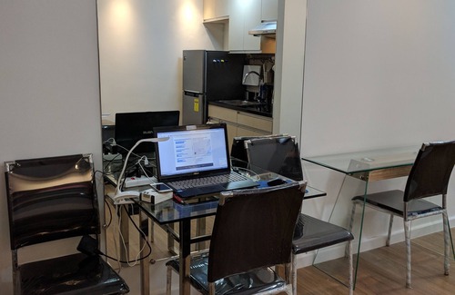 Poblacion District Condo | Abreeza Place with indoor parking and balcony