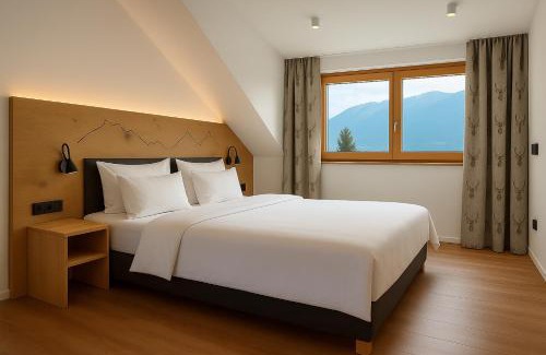 Verwaltungsgemeinschaft Hornergruppe House | ACHZEIT Family Retreat - Alpin-modernes Ferienhaus - 3 SZ - Garten - Kamin