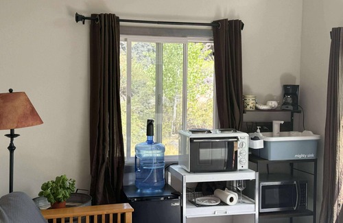 Deschutes River Woods Apartment | Adorable tiny home cozied up to lava rock!