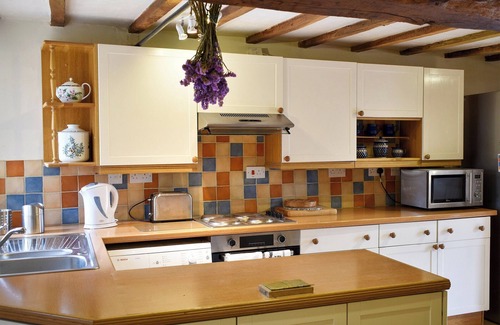 Tenbury Wells Cottage | Adorned with beams throughout.
