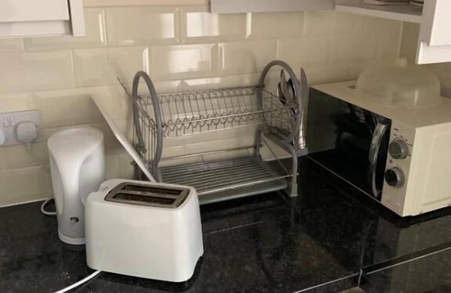 Coventry House | Affordable Suites