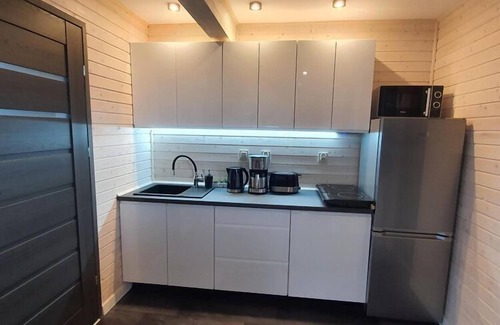 Rewal House | Air-conditioned holiday homes, summer pool, sauna