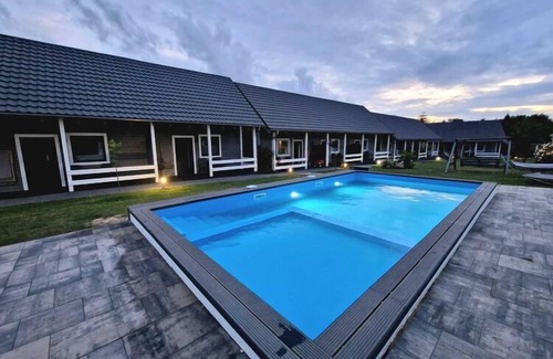 Rewal House | Air-conditioned holiday homes, summer pool, sauna