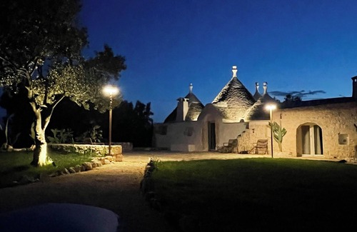 Ceglie Messapica Villa | ALMAPULIA beautiful trulli with private pool and veranda among Apulian olive trees