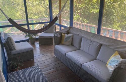 Burrell Boom House | Amazing Jungle Tree House right over the river with bikes and canoe