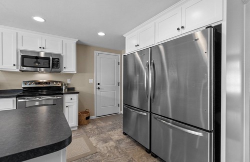 Ashwaubenon House | AMAZING LAMBEAU FIELD IN YOUR BACKYARD-RESERVE THE BEAUTIFUL STADIUM HOUSE NOW!