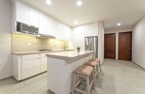 Libertad Apartment | Amazing New 2 BR 5 Min Downtown Pool Gym Parking