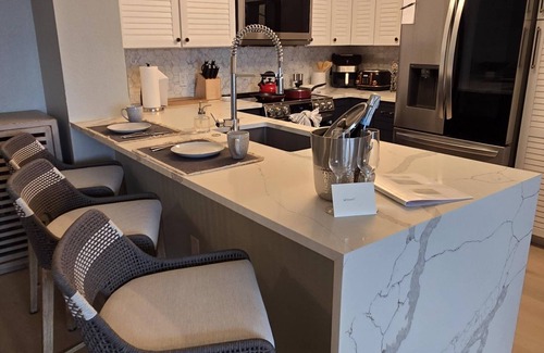 Hypoluxo Condo | “Anchored in Luxury” Re-Decorated and Re-Furnished Waterfront Show-Piece!