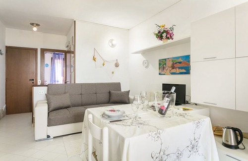 Paduledda Apartment | Apartment with Air Conditioning, Terrace and Sea View; Parking available