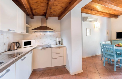 San Felice del Benaco Apartment | Apartment 'Antica Torre Catullo' with Mountain View, Wi-Fi and Air Conditioning