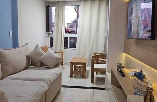 Contagem Apartment | Apartment 1 km from the beach with air conditioning and garage