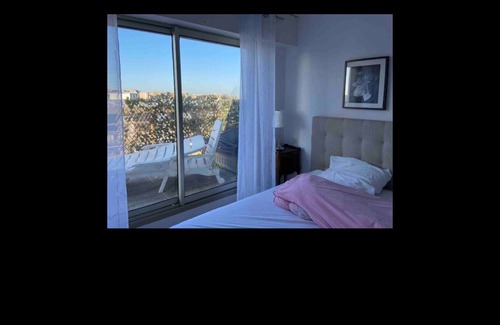 Saint-Igneuc Apartment | Apartment 5 minutes from the beach and town center with sea view