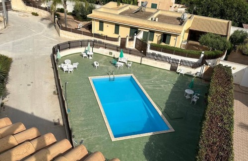 Marsala Apartment | Apartment 'Ammare' with Shared Pool, Wi-Fi and Air Conditioning