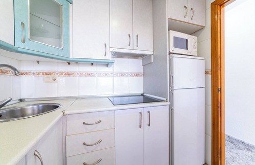 Aguadulce Apartment | Apartment 'Bahia Almeria' with Shared Pool, Shared Garden and Air Conditioning