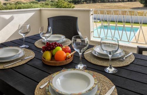 La Muddizza Apartment | Apartment Baia dei tramonti by Interhome