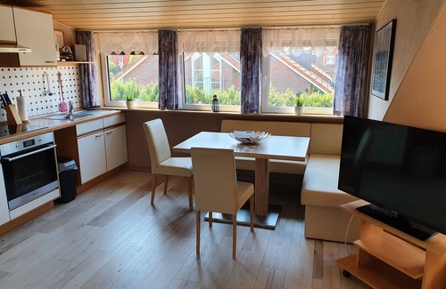 Horumersiel Apartment | Apartment 'Doppelzimmer' with Shared Terrace, Private Garden and Wi-Fi