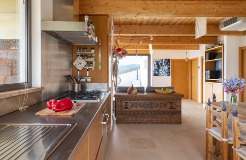 Cala Gonone Apartment | Apartment 'Dream In The Sky' with Sea View, Wi-Fi and Air Conditioning