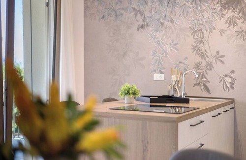 Garda Apartment | Apartment 'Eleonora C3' with Shared Pool, Private Terrace and Air Conditioning