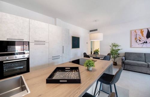 Garda Apartment | Apartment 'Eleonora C3' with Shared Pool, Private Terrace and Air Conditioning