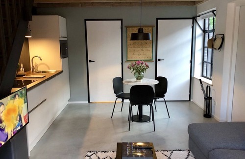 Heerlen Apartment | Apartment for two people in renovated former primary school with lovely garden.