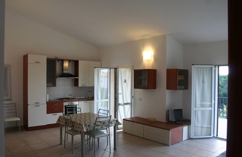 Pianotolli-Caldarello Villa | Apartment in Villa with swimmingpool and garden of 2000mq