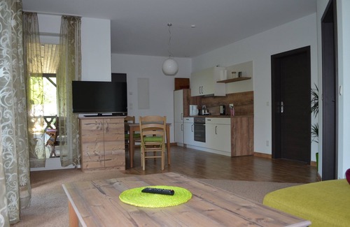 Burg-Kauper Apartment | Apartment Heuboden - Spreewaldscheune am Fließ-Ferienwohnungen am Wasser in Burg