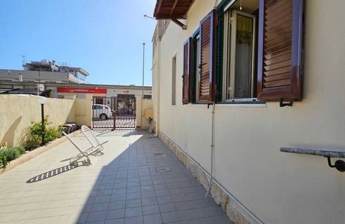 Fiumicino Apartment | Apartment in central area with outdoor space 10 minutes from the airport