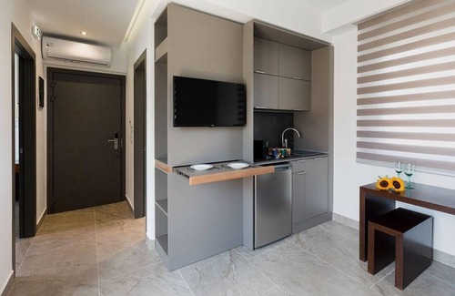 Polichrono Apartment | Apartment in Pallini with Private Balcony and Garden View