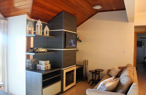 Floresta Apartment | Apartment in the center of Gramado with view, fireplace and hydro bath