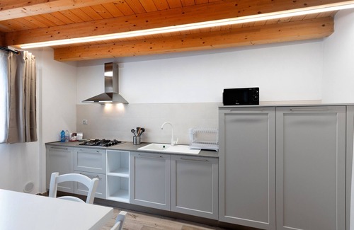 Portese Apartment | Apartment 'Soppalco - Isola Trimelone' with Shared Pool, Wi-Fi and Air Conditioning