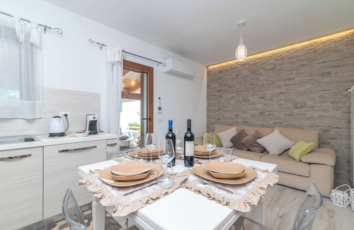 Santa Teresa di Gallura Apartment | Apartment 'Trilo Nina' with Private Terrace, Private Garden and Air Conditioning