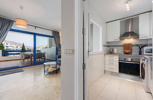 Castillo de Sabinillas Apartment | Apartment 'Kym' with Mountain View, Wi-Fi and Air Conditioning