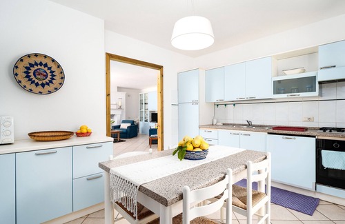 Sas Linnas Siccas Apartment | Apartment 'La Vela Rossa' with Shared Pool, Wi-Fi and Air Conditioning