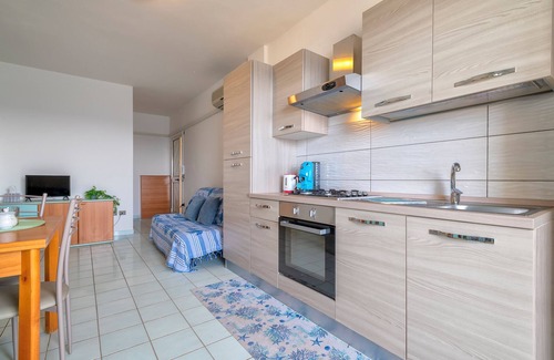 Castelsardo Historic Centre Apartment | Apartment 'La Marina Beach House' with Sea View, Balcony and Air Conditioning