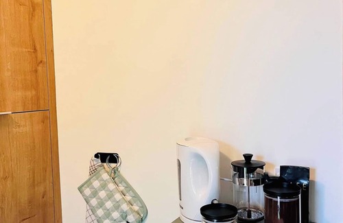 Bielle Apartment | Apartment 'La Suite Unique Belle Vue - Jardin' with Mountain View, Shared Pool and Wi-Fi