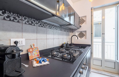 Santa Lucia Apartment | Apartment 'Mille E Una Notte - Suoni D'Acqua' with Private Terrace, Wi-Fi and Air Conditioning