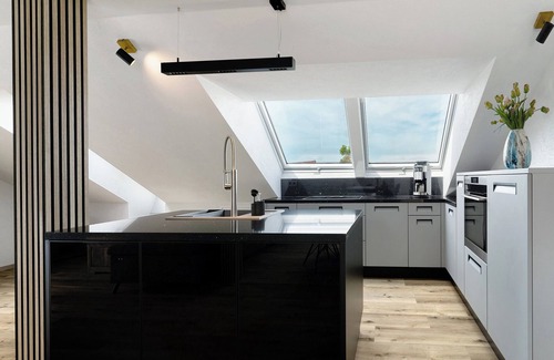 Rheinau Apartment | Apartment 'Moderne Offene Dachgeschoßwohnung' with Shared Pool, Shared Garden and Wi-Fi