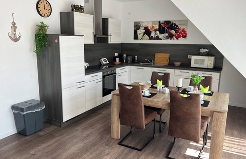 Papenburg Apartment | Apartment "Neptun" Papenburg 2SZ EBK Modern bathroom Large roof terrace New building WLAN