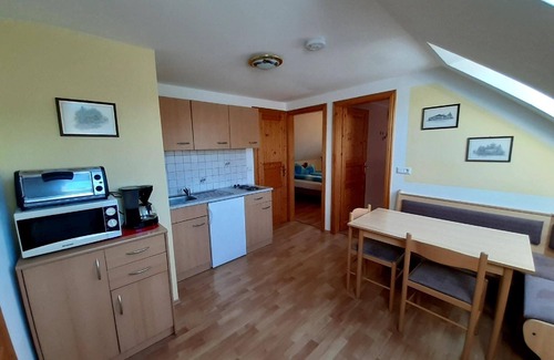 Gundersdorf Apartment | Apartment on a vineyard in a quiet, rural location, with a rustic balcony and a children’s playground on site